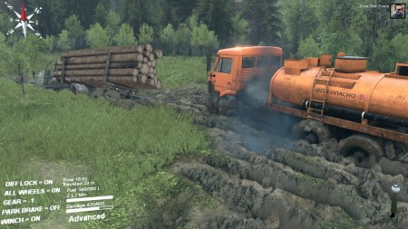 There was a hearty fuel-tanker near the logging camp. I took control and initially made a botched effort at dragging my main truck out of the mud.